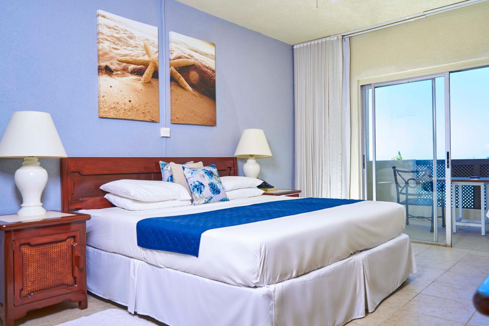 Tropical Sunset Beach Apartment Hotel Saint James Exterior foto