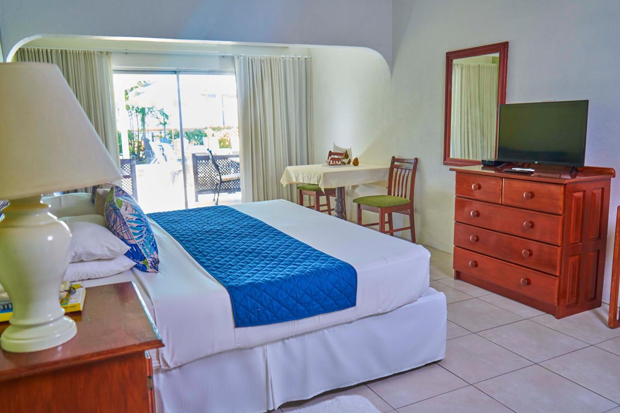Tropical Sunset Beach Apartment Hotel Saint James Zimmer foto